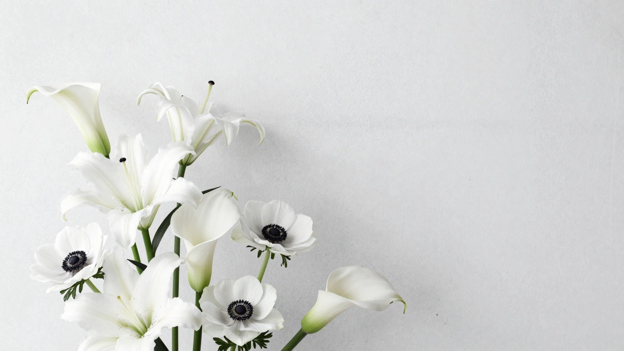 Minimalist white lilies and anemones arranged with modern architectural style