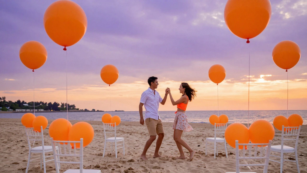 Beach wedding with neon orange balloons at sunset